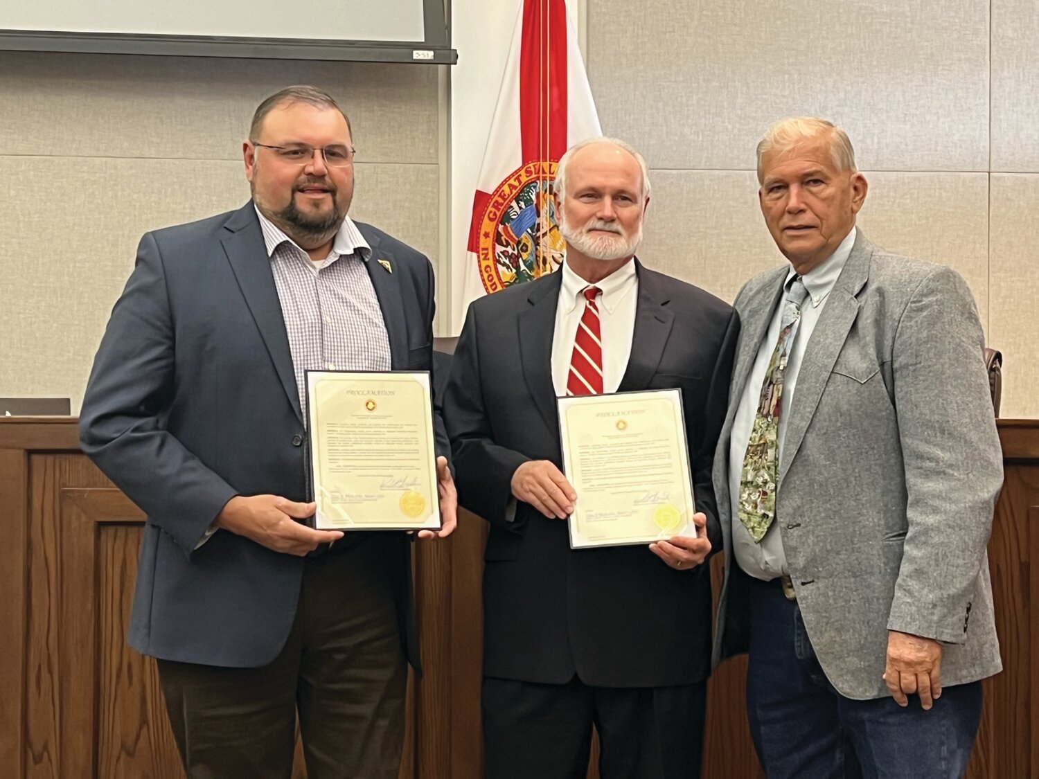 OKEECHOBEE – The Okeechobee County Board of Commissioners designated Feb. 18-24 as Engineers Week. Left to right are Marcos Montes De Oca, Stef Mathes and Okeechobee County Commission Chair David Hazellief. Founded by NSPE in 1951, Engineers Week is dedicated to ensuring a diverse and well educated future engineering workforce by increasing understanding of and interest in engineering and technology careers. Today, Engineers Week is a formal coalition of more than 70 engineering, education, and cultural societies, and more than 50 corporations and government agencies. Dedicated to raising public awareness of engineers' positive contributions to quality of life, Engineers Week promotes recognition among parents, teachers, and students of the importance of a technical education and a high level of math, science, and technology literacy, and motivates youth, to pursue engineering careers in order to provide a diverse and vigorous engineering workforce. [Photo by Katrina Elsken/Lake Okeechobee News]